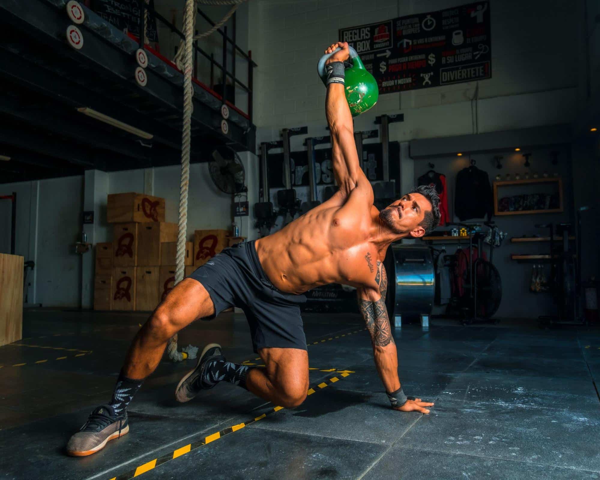 Man working out with kettle bell