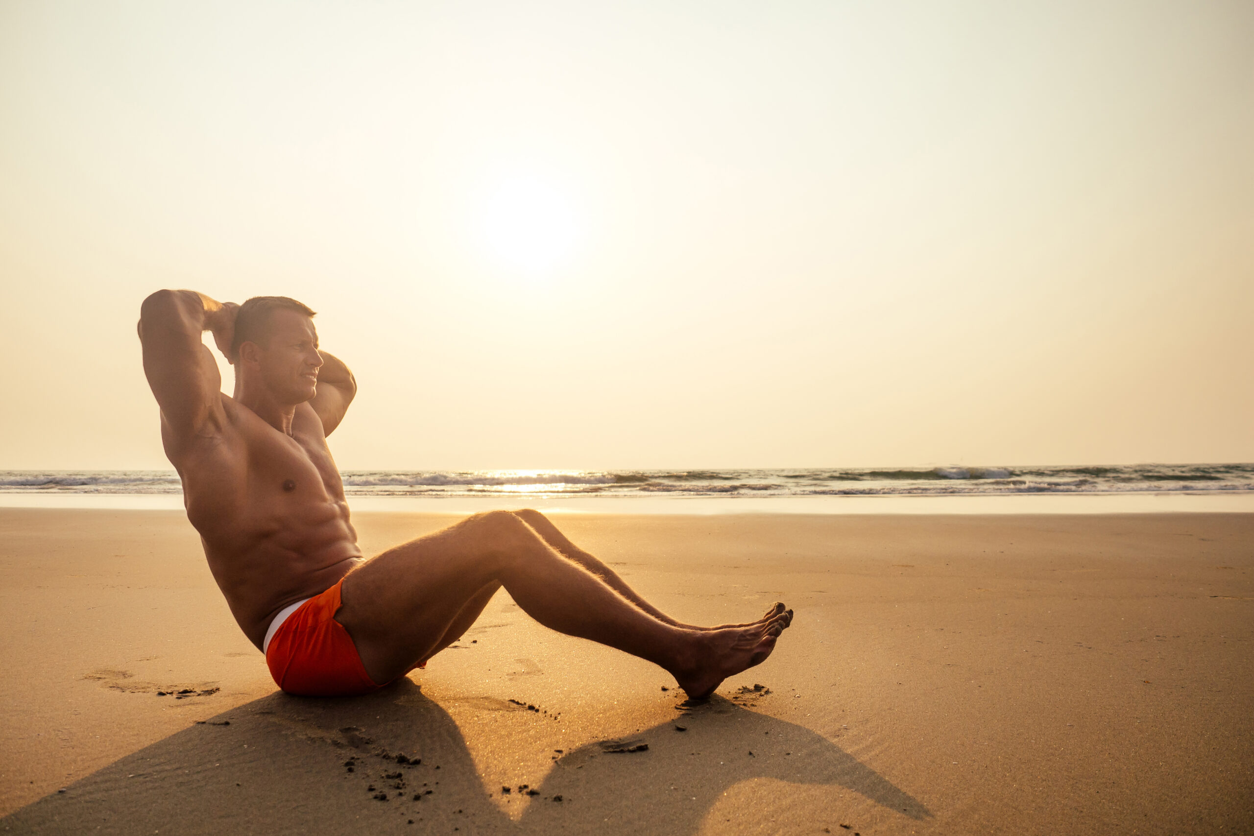 man wearing an underwear at the beach